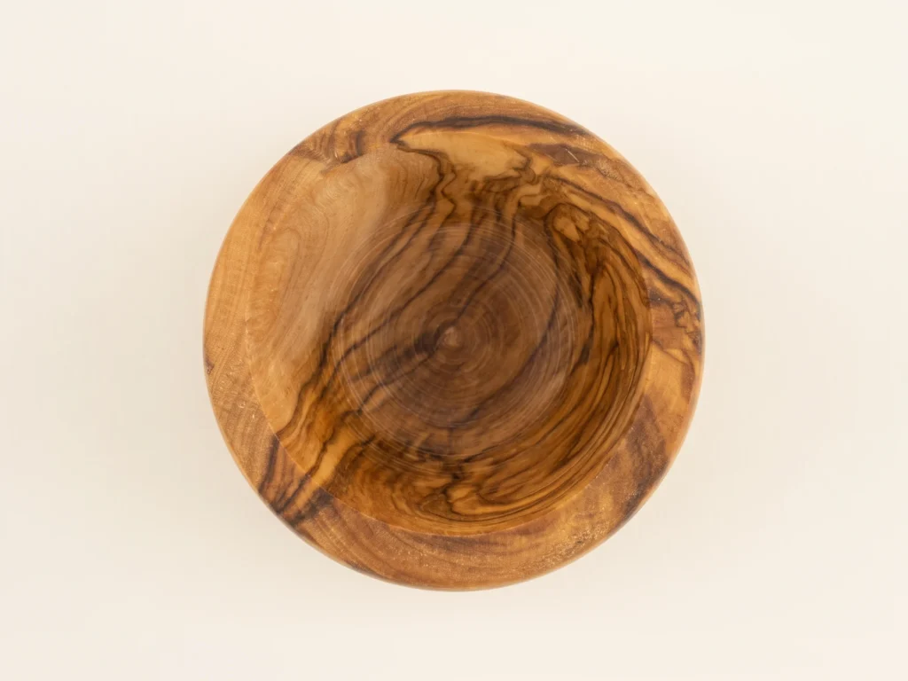 Olive wood egg cup TR-22 direct overhead 90-degree view into smooth rounded interior cavity