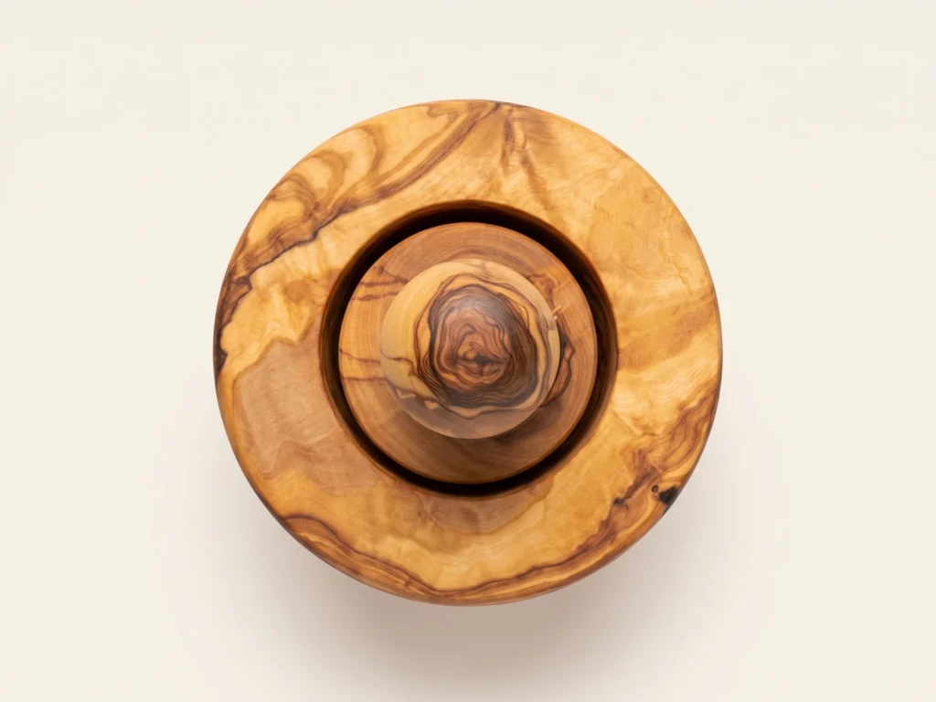 Top-down overhead view of wide circular rim collar and interior chamber of garlic mortar TR-10