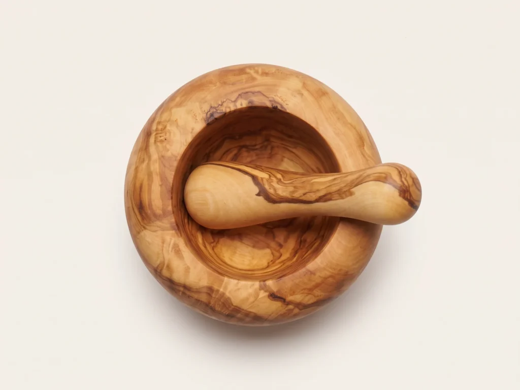 Top-down overhead view of smooth circular olive wood mortar and pestle TR-6
