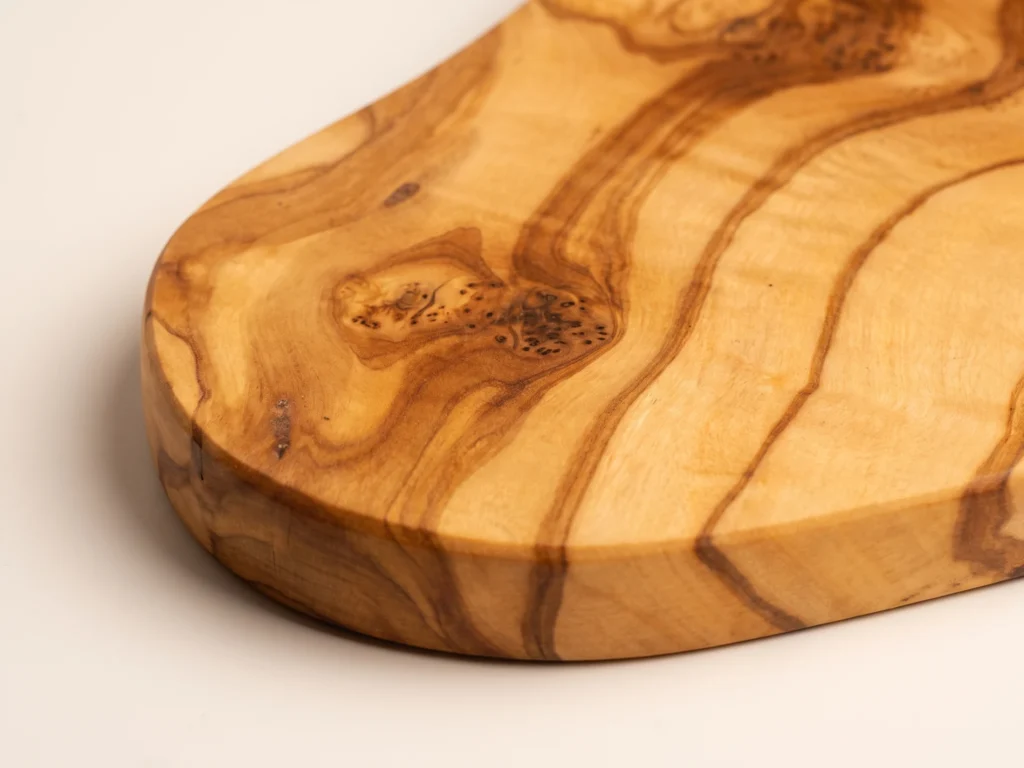 Small organic olive wood cutting board ND-1 macro detail knots and grain
