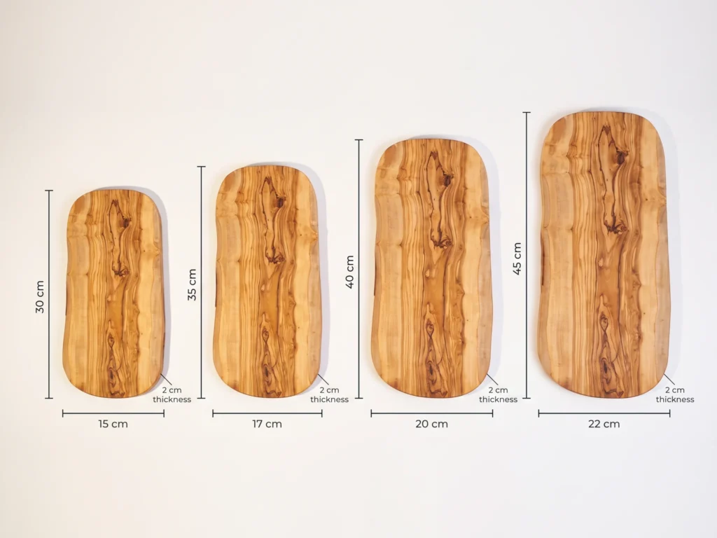Natural shaped olive wood cutting board size comparison showing 30x15, 35x17, 40x20 and 45x22 cm