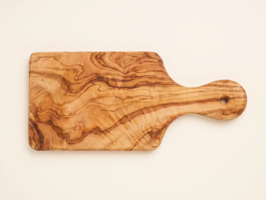Olive wood persil board overhead 90-degree technical flat-lay view