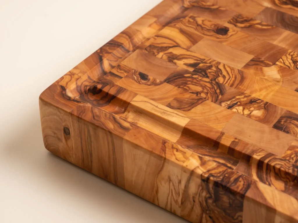 Rectangular butcher block cutting board macro detail groove and grain