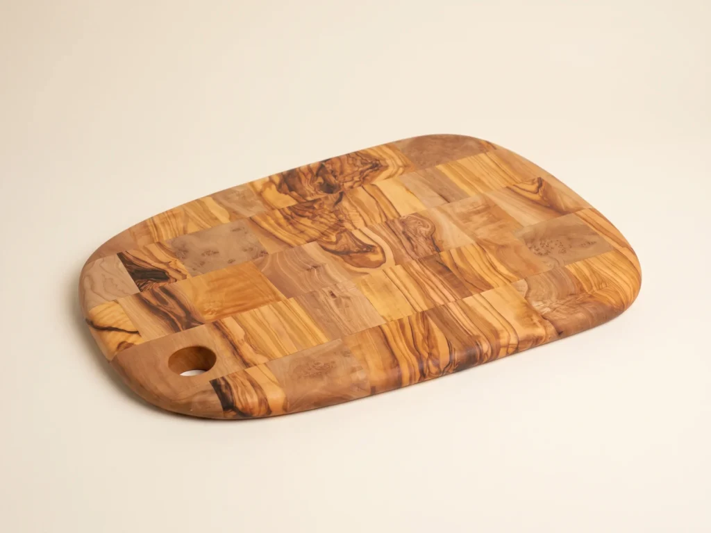 Special shape rounded olive wood cutting board three-quarter perspective view
