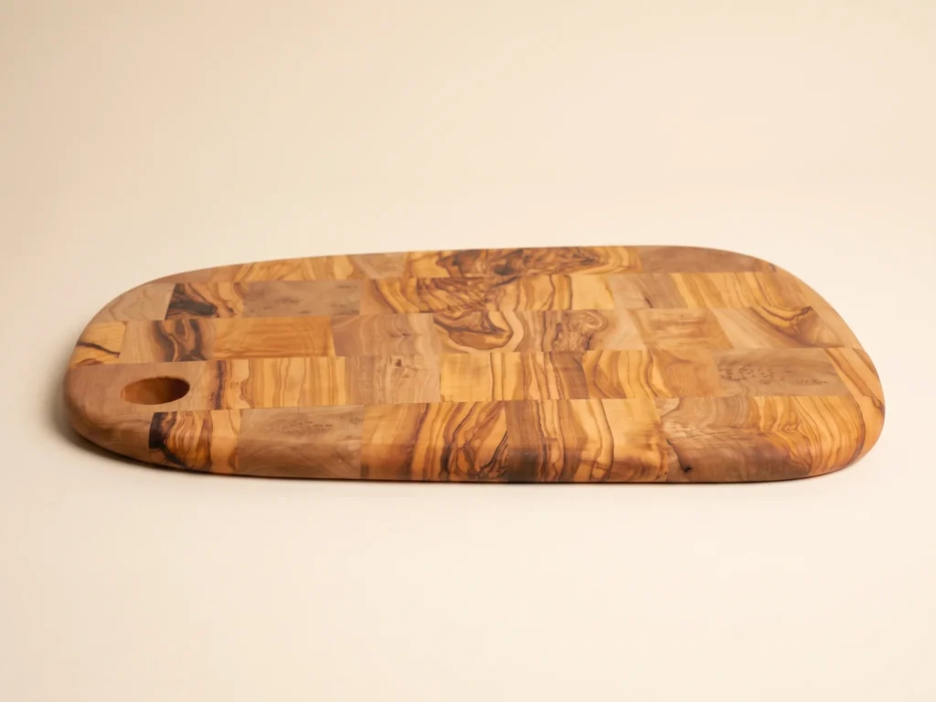 Special shape rounded olive wood cutting board low profile 2 cm thickness view
