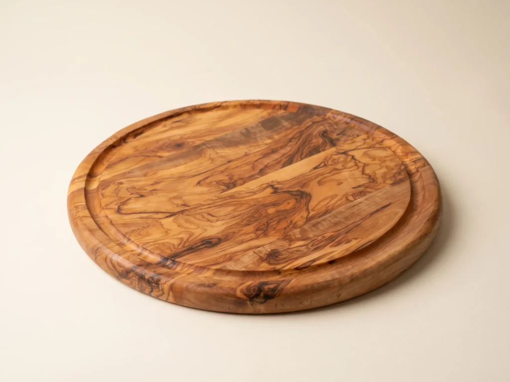 Round cheese board with groove three-quarter perspective view