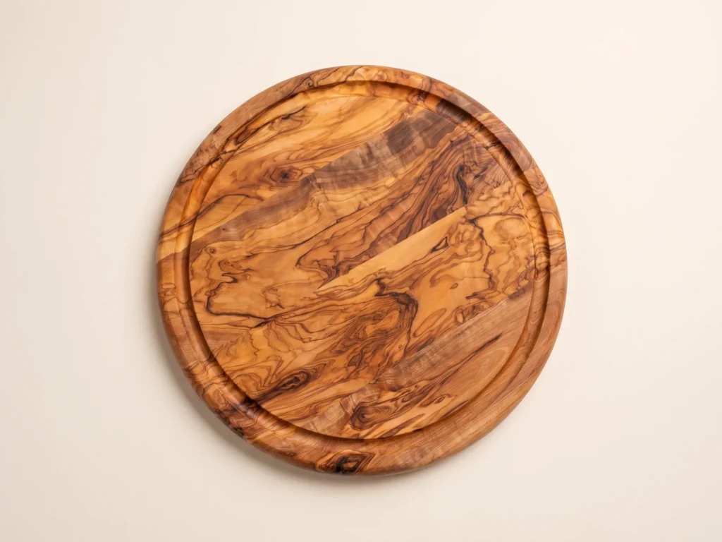 Round cheese board with groove overhead view