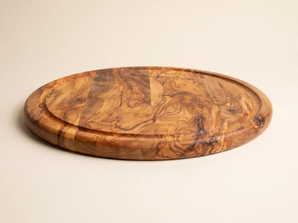 Round cheese board with groove edge profile view